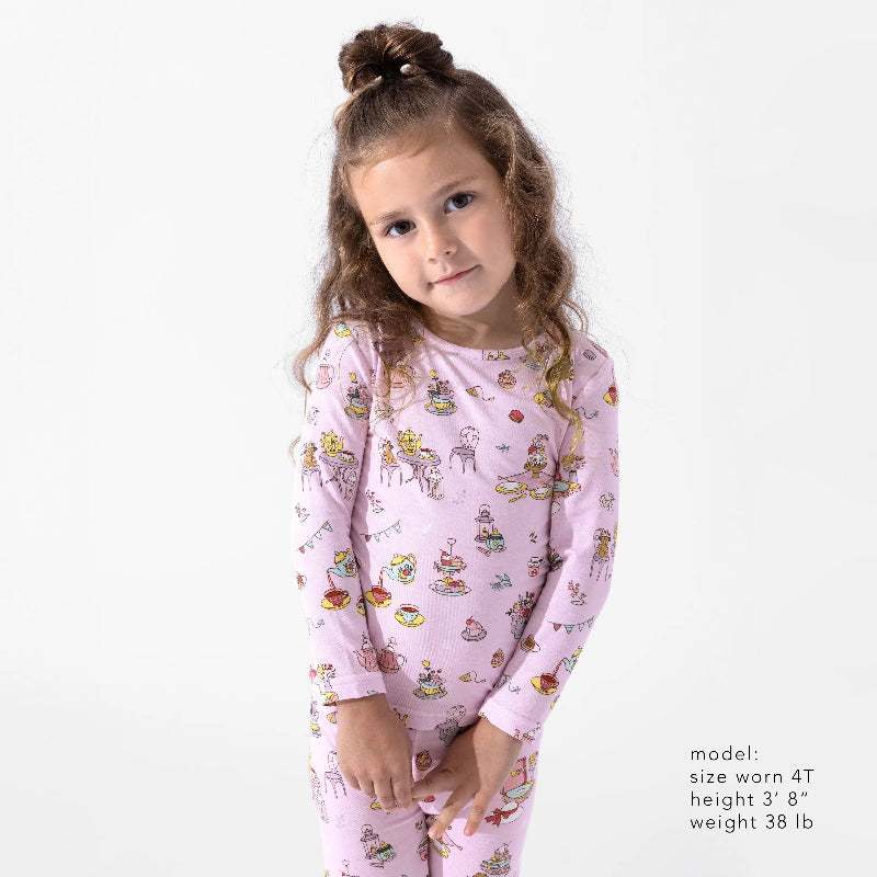 Bellabu Bear Bamboo Kids Pajamas Tea Party; lavender bamboo sleepwear with tea party prints worn by a girl.