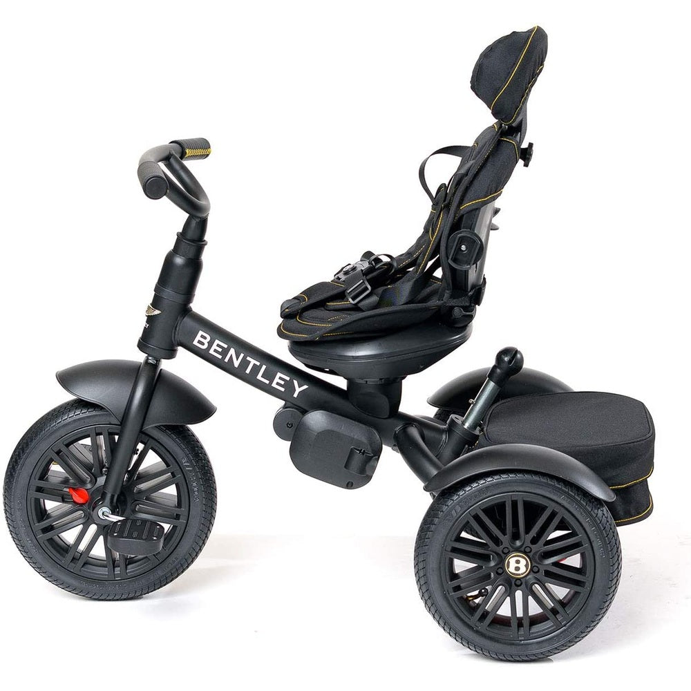 Bentley 6-in-1 Trike V2 baby tricycle, black frame with padded seat and harness, anniversary edition