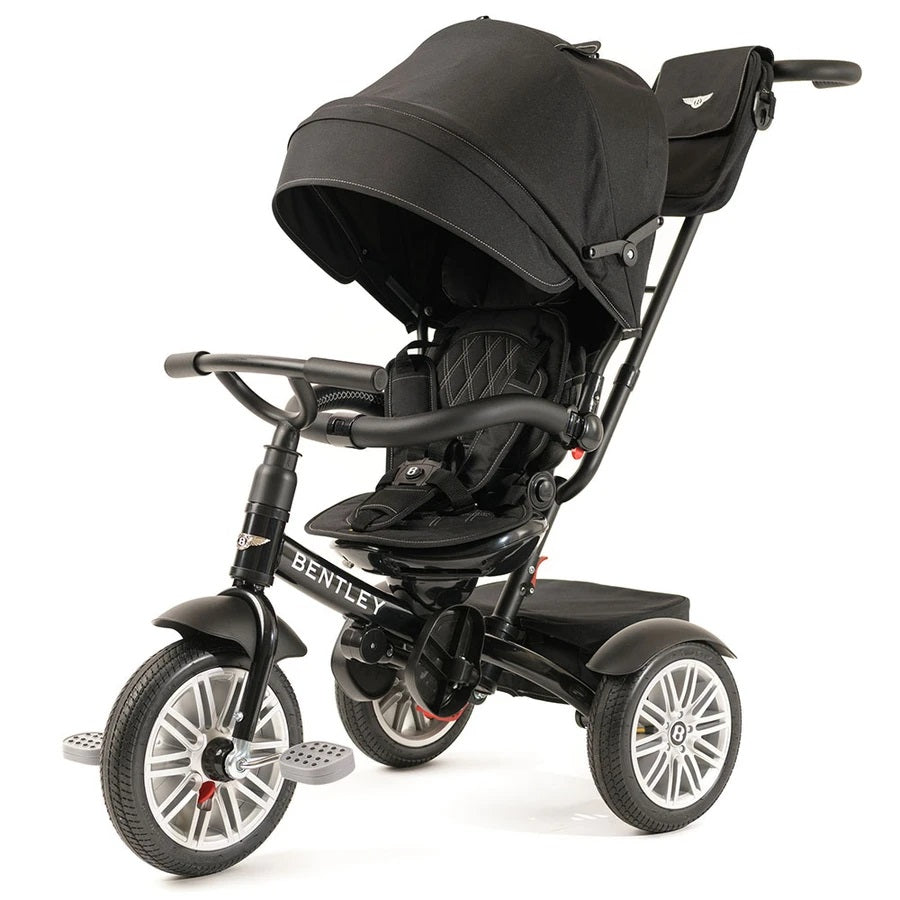 Bentley Trike 6-In-1 V2 Onyx Black tricycle with canopy, padded seat, adjustable handlebars, and pedal platform.