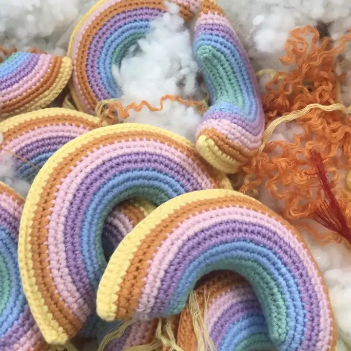 Best Years pastel rainbow crochet plush snakes set; soft, colorful stuffed toys.
