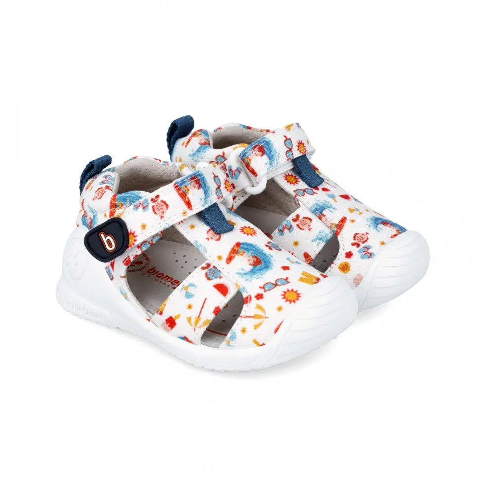 Biomecanics Canvas Sandals Blanco with colorful print; white toddler sandals with Velcro straps fastened.