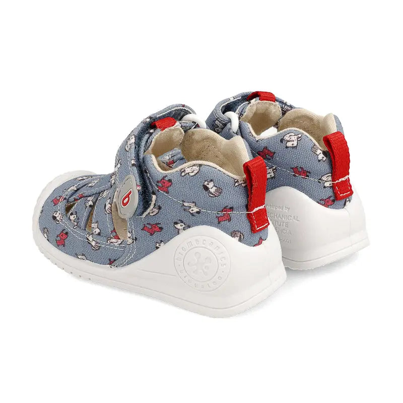 Biomecanics Sandalla Vaquero Y blue denim toddler sandals with white sole, red pull tabs, pair.