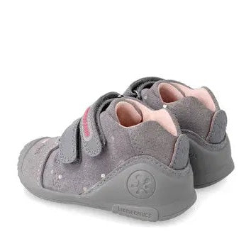 Biomecanics Shadow Cat Boot: gray suede toddler shoe with pink lining and Velcro straps, shown on a child stepping forward.