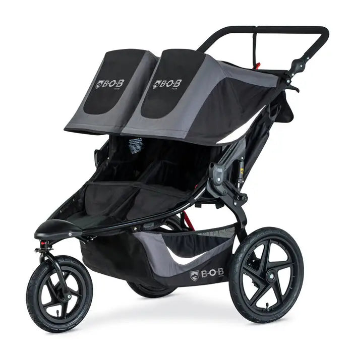 BOB Revolution Flex 3.0 Duallie Stroller: dual-seat black/gray stroller with rugged all-terrain wheels.