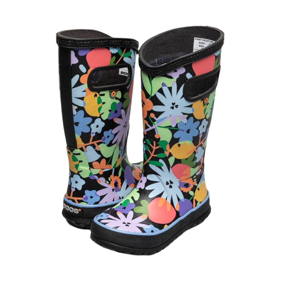 BOGS Rainboot Overlap Flowers kids' knee-high rubber boots in vibrant floral print, two boots standing side by side.