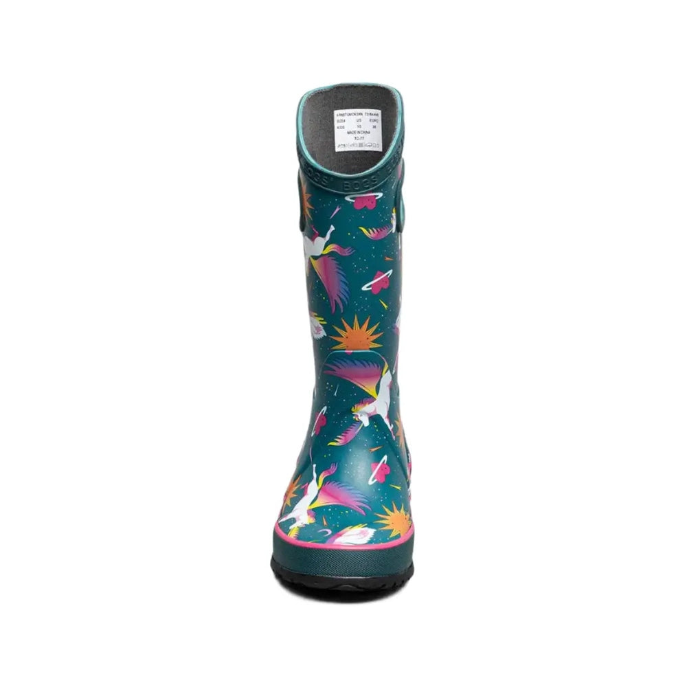 BOGS Rainboot Unicorn Swan toddler boot in teal with colorful unicorn motifs, standing upright to show rugged sole.