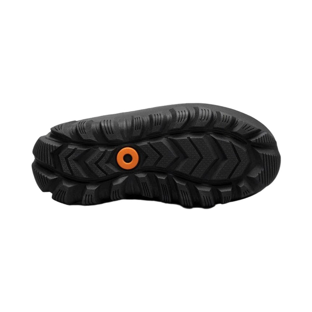 BOGS kids' winter boot sole in black with orange eyelet detail
