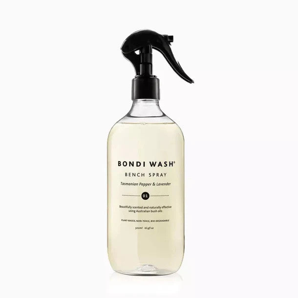 Bondi Wash Bench Spray 500 ml, clear bottle with pale liquid and black trigger sprayer, standing upright.