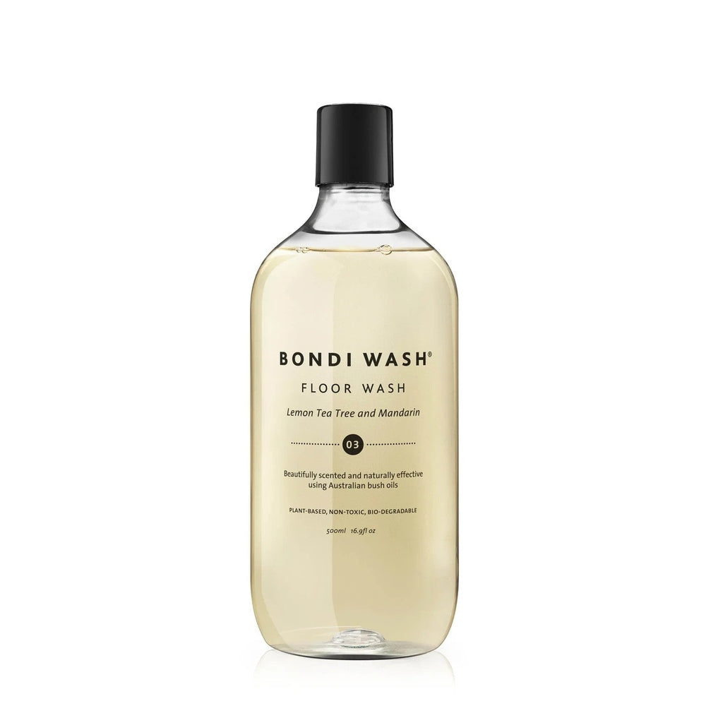 Bondi Wash Floor Wash 500 ml bottle, clear liquid with black cap, lemon tea tree and mandarin scent on label.