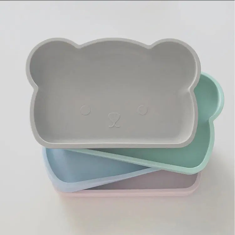 Bopomofo Bear Silicone Plate set of 4 pastel colors stacked, perfect for mealtime with little ones.