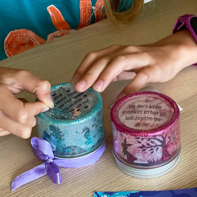 Box Candiy Totally Twilight glitter jars, two blue and pink with purple ribbons and printed quotes