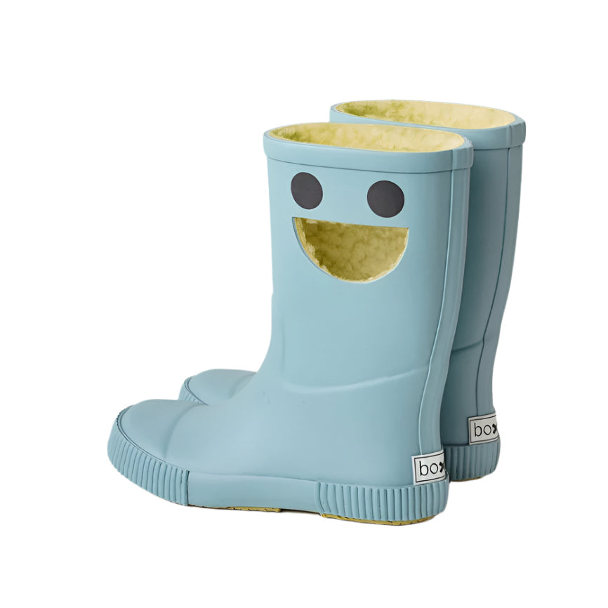 Boxbo Wistiti Fleece Lined Rainboots Misty Ice Blue for kids, two boots showing yellow fleece lining and a cheerful smiley face.