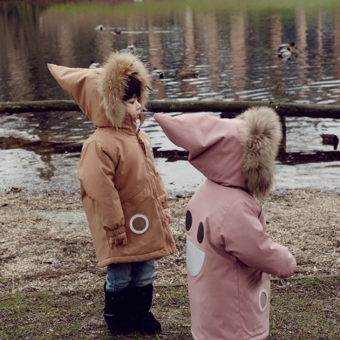Boxbo Wistiti fleece-lined waterproof snowproof fur jackets in dusty rose pink and tan worn by two toddlers at