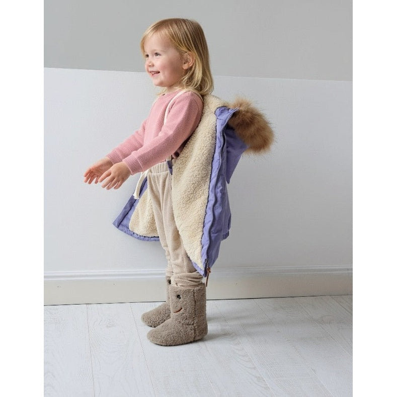 Boxbo Wistiti Fleece Lined Waterproof Snowproof Fur Jacket Mauve Lavender worn by a smiling toddler indoors; cream sherpa lining shown