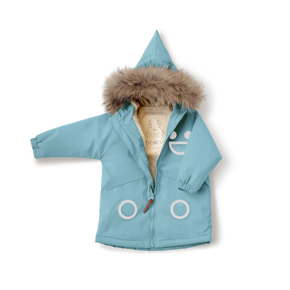 BOXBO Boxbo Wistiti fleece-lined waterproof snowproof blue jacket, open to show warm sherpa lining and fur-trimmed hood.