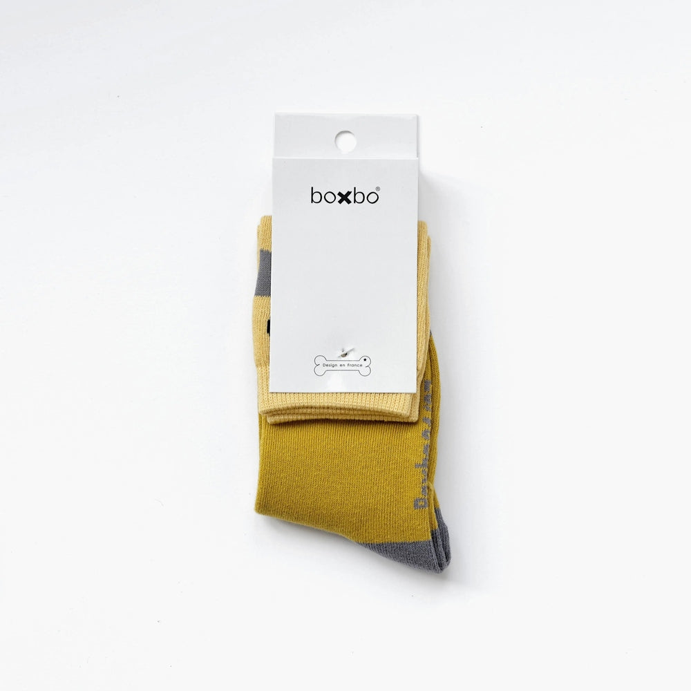 Boxbo Wistiti High Sock Yellow baby socks folded under a white tag, yellow with gray toe.