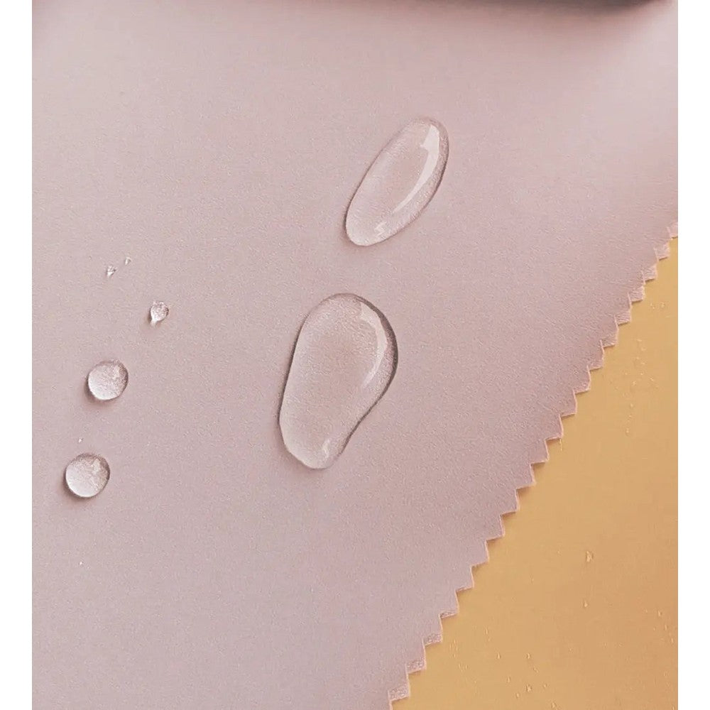 Boxbo Wistiti Windbreaker Rain Jacket Pink, pink water-resistant fabric beads droplets to show rain protection.