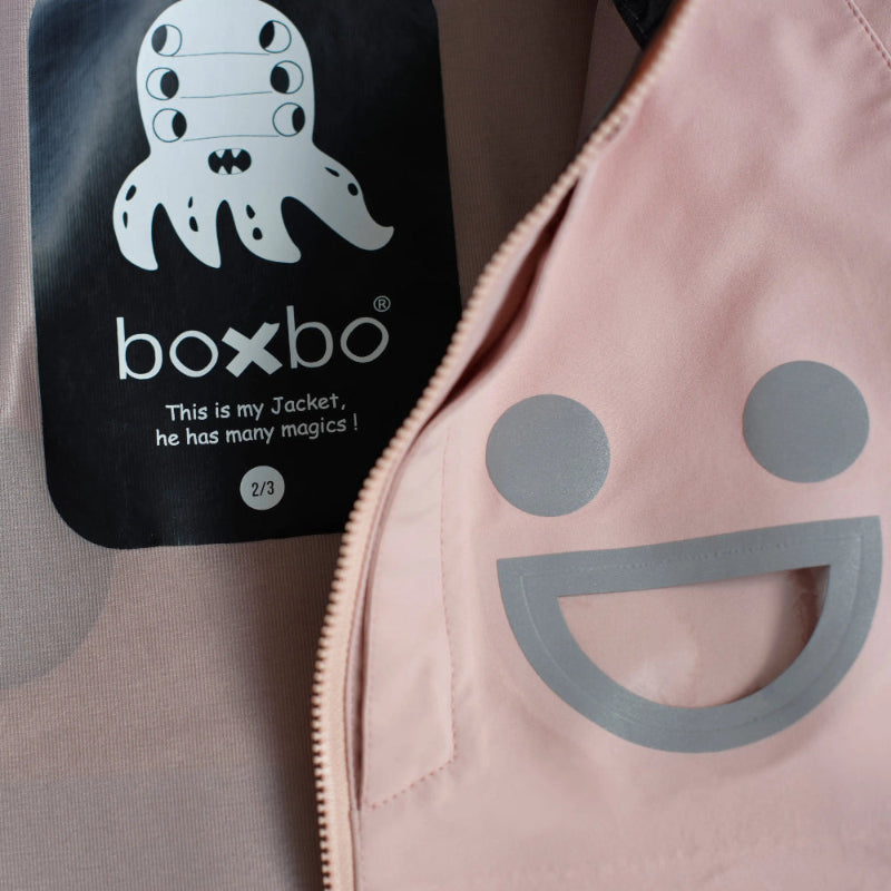 Boxbo Wistiti Windbreaker Rain Jacket Pink with gray smiley graphic, zipper open showing lightweight coat.