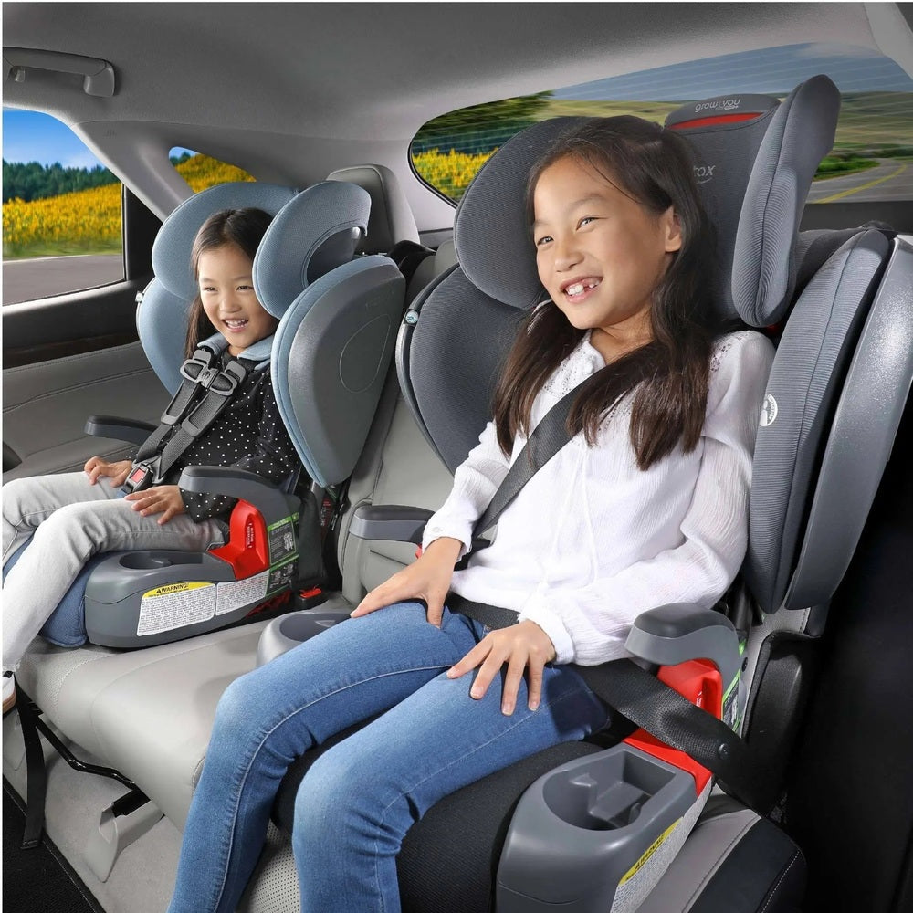 Britax Grow With You Clicktight Car Seat Safewash in gray, two children buckled in with secure harnesses, smiling.