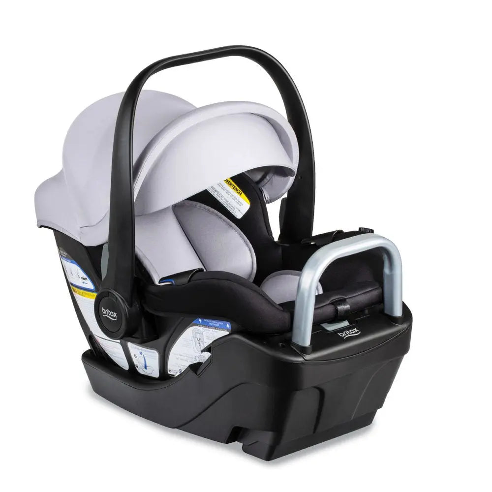 BRITAX Willow S infant car seat with gray padding, integrated carry handle resting on the base.