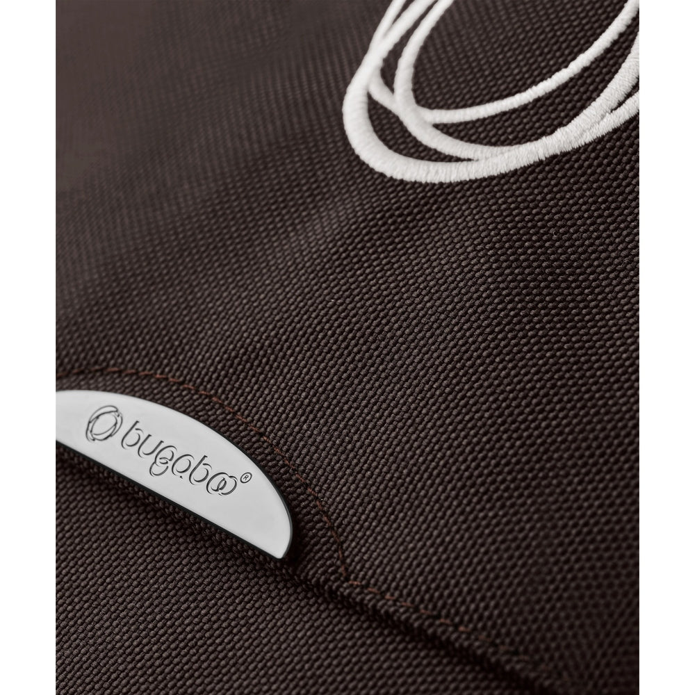 Bugaboo Donkey 6 Mono Stroller in Brown fabric with white drawstrings and silver logo plate.