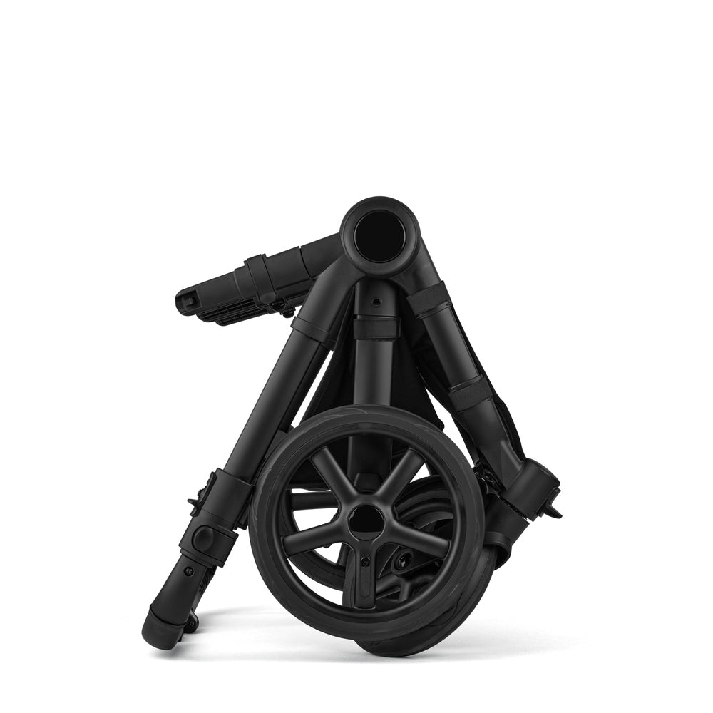 Bugaboo Donkey 6 Mono Stroller Complete in Black folded with wheels visible