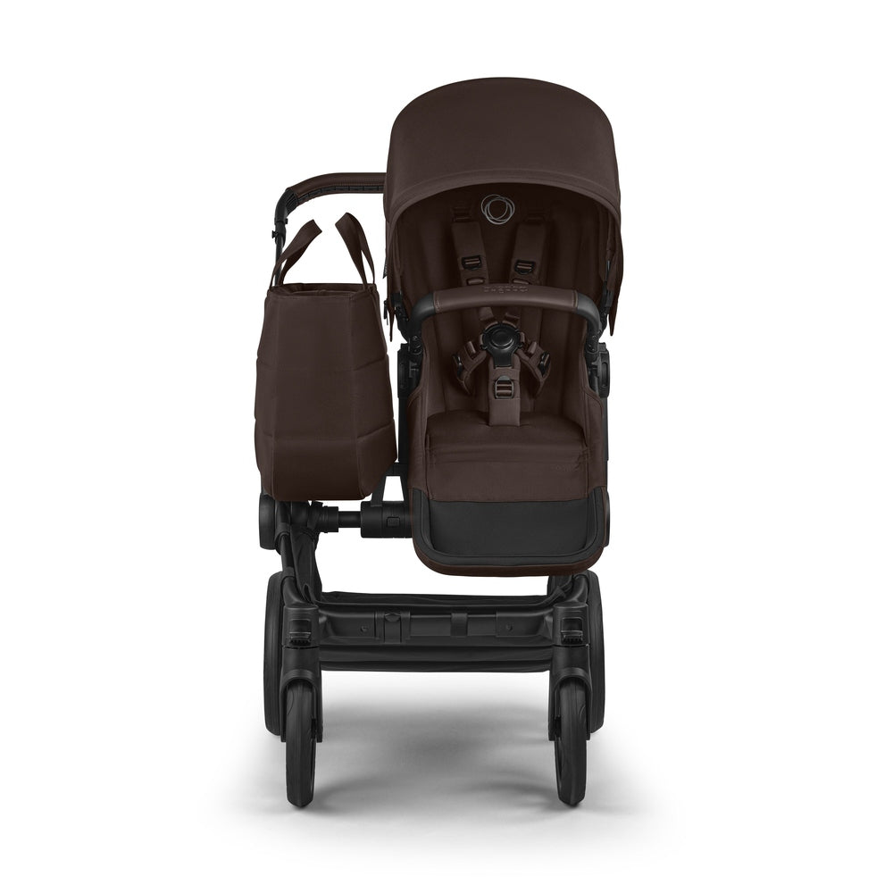 Bugaboo Donkey 6 Mono Stroller in Chocolate Brown front view with brown diaper bag attached.