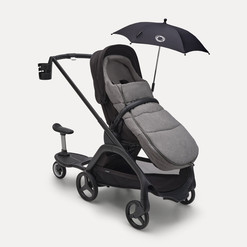 Bugaboo Dragonfly Stroller Complete in gray with extended sun canopy and cup holder, ready for a sunny stroll.