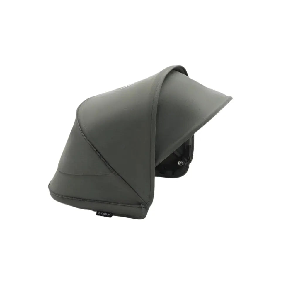 Bugaboo Dragonfly sun canopy in gray fabric attached to a stroller for shade.