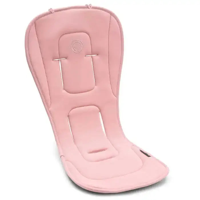 Bugaboo Dual Comfort Seat Liner in pink fabric, displaying cushioned seat with harness openings for stroller comfort.