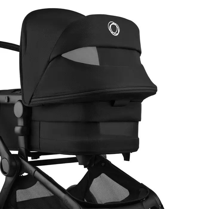 Bugaboo Fox 5 Renew Complete Stroller in black with bassinet attached, showing sturdy frame and storage basket.