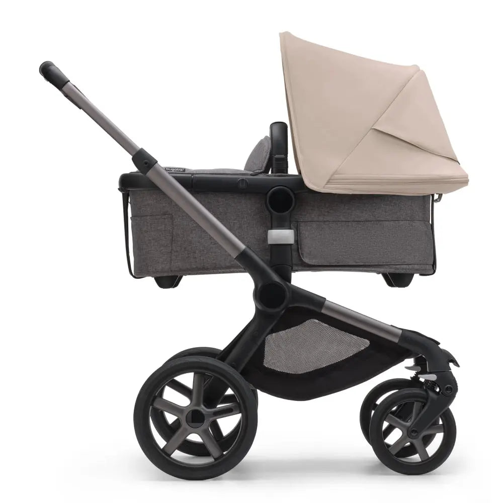 Bugaboo Fox 5 Sun Canopy attached to a grey stroller frame with beige canopy shade.