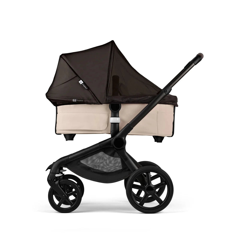Bugaboo Fox/Donkey/Kangaroo Mosquito Net fits a Bugaboo stroller, draped over the seat to keep insects out.