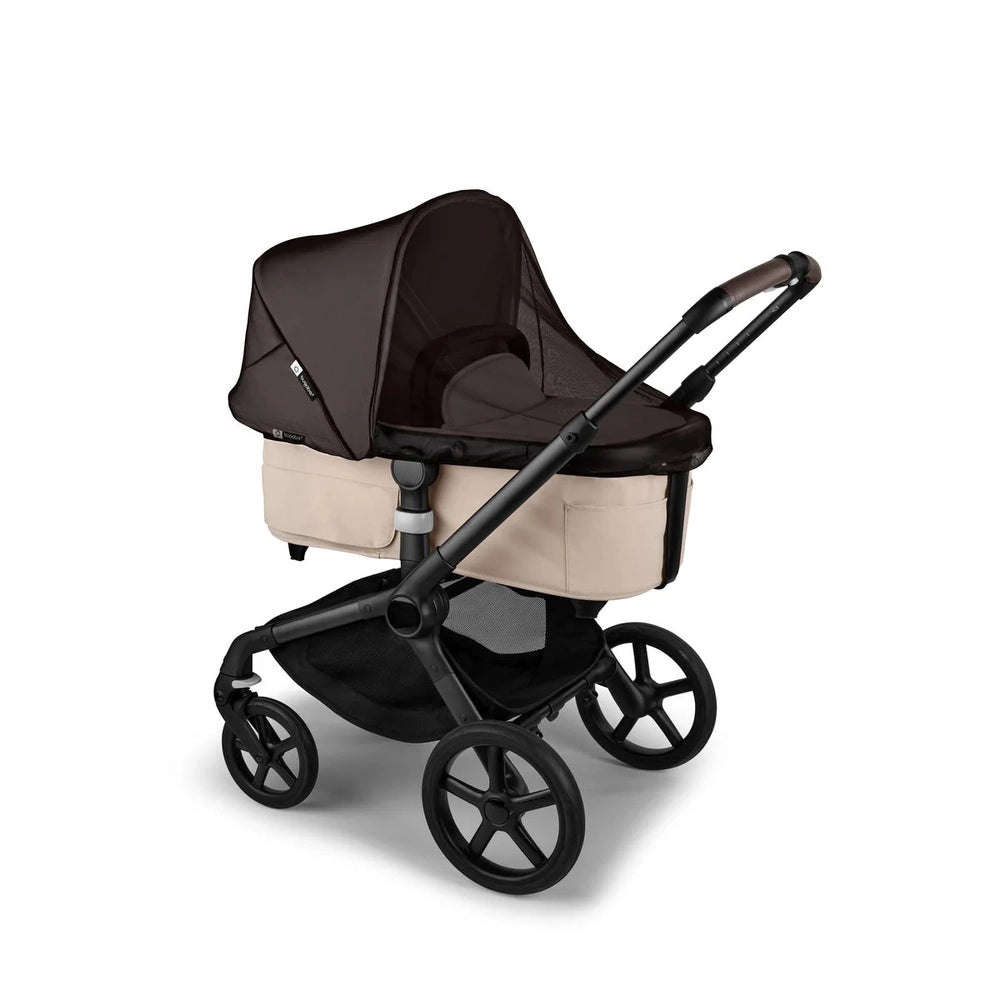 Bugaboo mosquito net for Bugaboo Fox/Donkey/Kangaroo stroller, dark brown canopy shielding baby in bassinet.