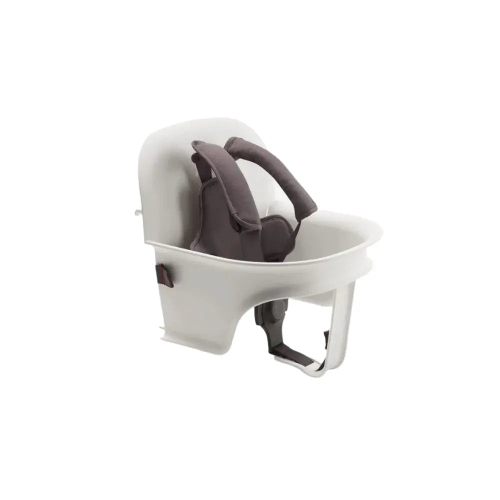 Bugaboo Giraffe Baby Set high chair in white frame with gray padded harness secured for safe seating.
