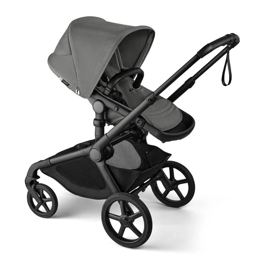Bugaboo Kangaroo Complete Stroller in gray bassinet with black frame, showcasing canopy, storage basket, and four-wheeled chassis.