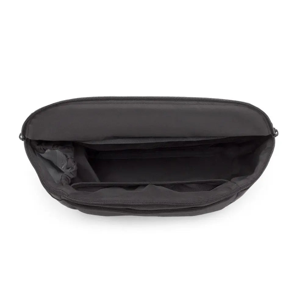 Bugaboo Organizer in black, opened to reveal multiple inner pockets and zip closure for stroller storage