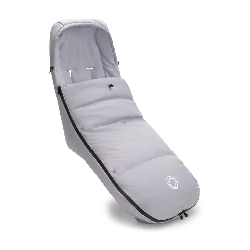 Bugaboo Performance Winter Footmuff in light gray, insulated stroller cocoon with hood and side zipper.