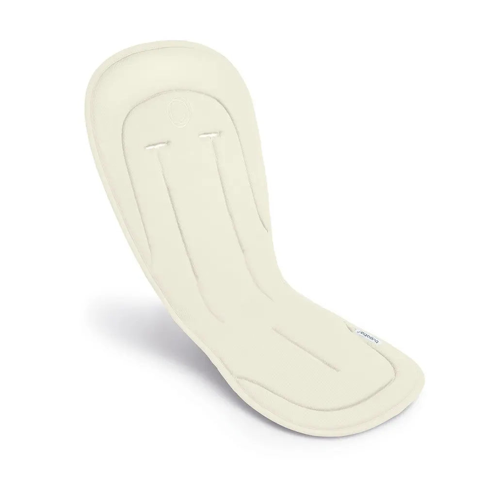Bugaboo Seat Liner ivory cream fabric with padded support, laid flat to show full length.
