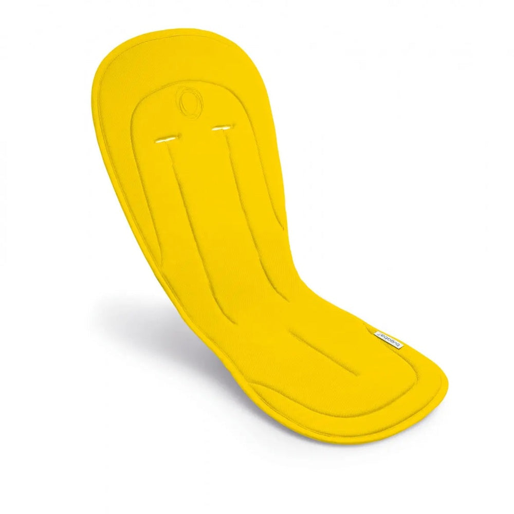 Bugaboo Seat Liner in bright yellow fabric laid flat for stroller comfort and easy cleanup.