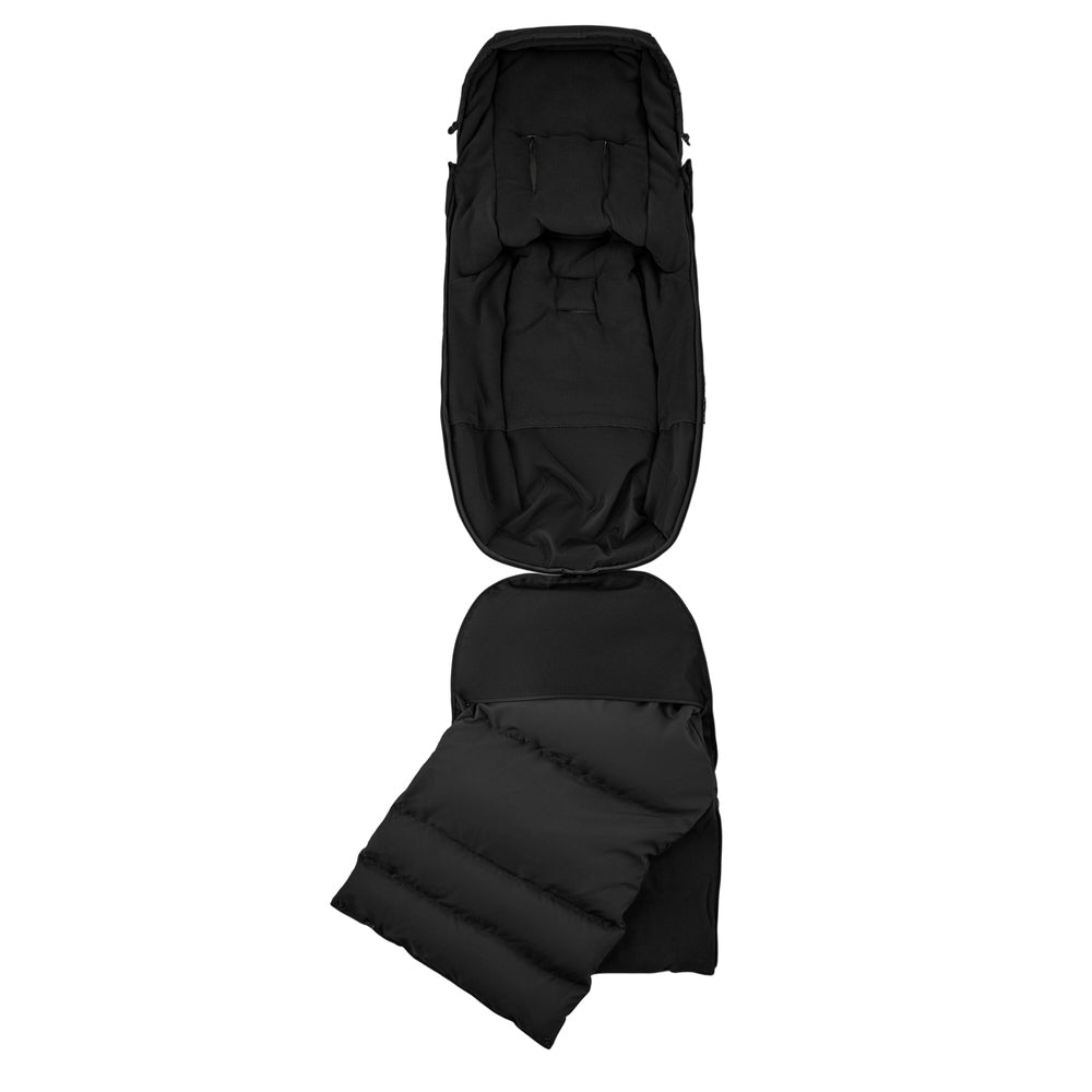Bugaboo Thermolite Performance Footmuff in black, padded and quilted stroller accessory shown opened and folded.