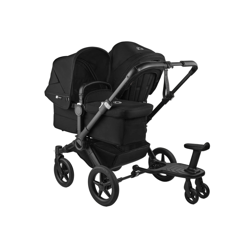 Bugaboo Wheeled Board in black attached to a Bugaboo stroller, showing the standing platform for an older child.