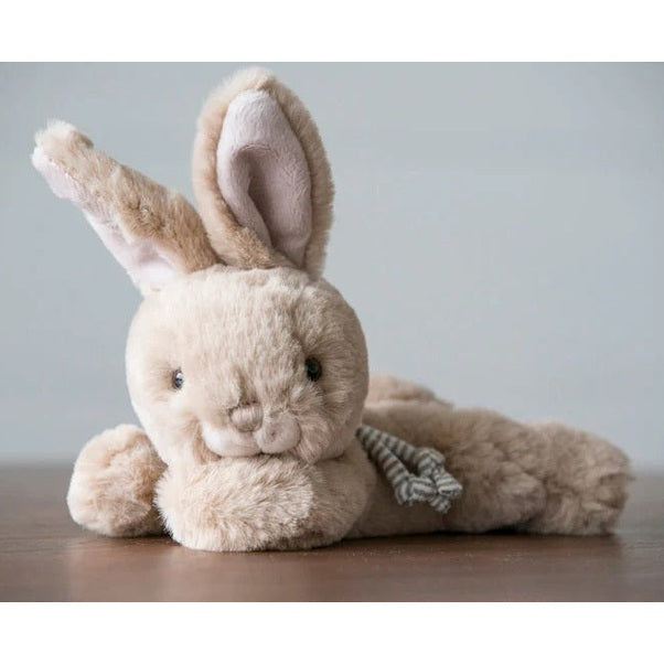 Bukowski Bears Buster Bunny stuffed animal, beige plush with floppy ears, gently posed on a wooden table.