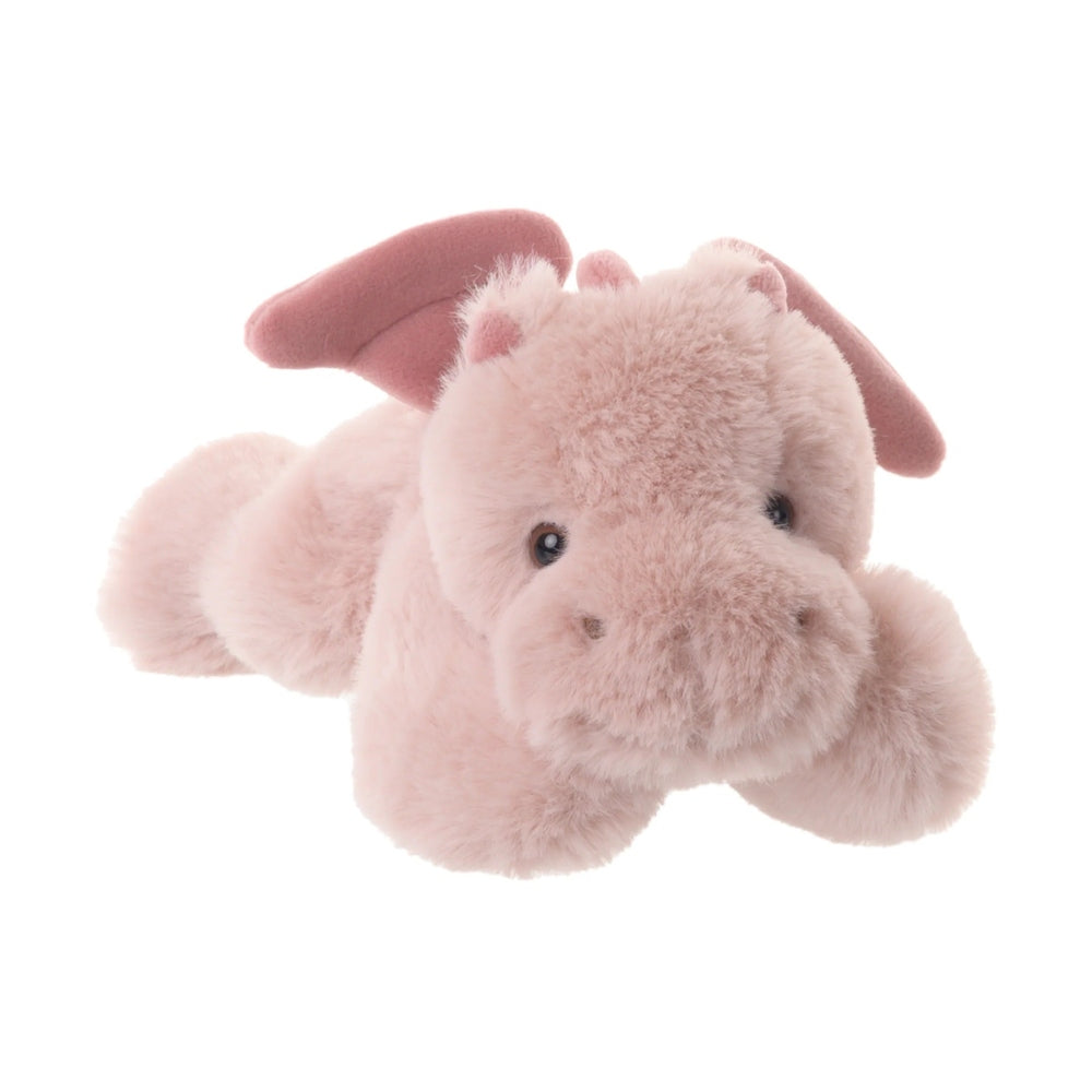 Bukowski Bears Little Drago Ruby plush toy in soft pink faux fur with floppy ears shown cuddling up for comfort.