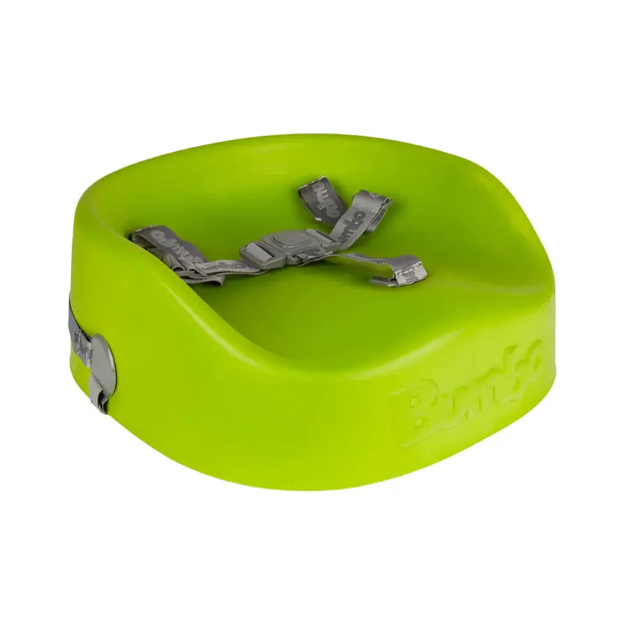 Bumbo Booster Seat lime green with gray harness; sturdy plastic booster with quick-clip straps.