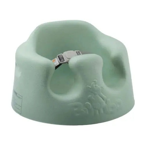 BUMBO Floor Seat in light green with integrated safety harness visible inside for babies.