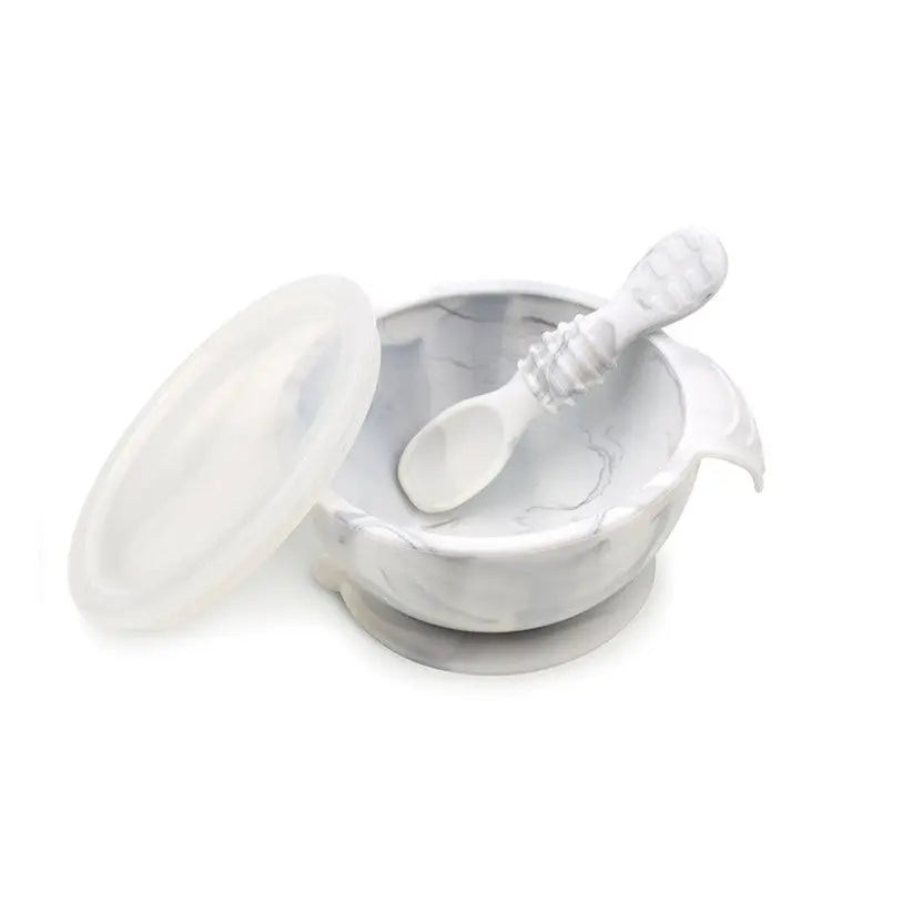 BUMKINS Silicone First Feeding Set marble bowl with lid and spoon resting inside.