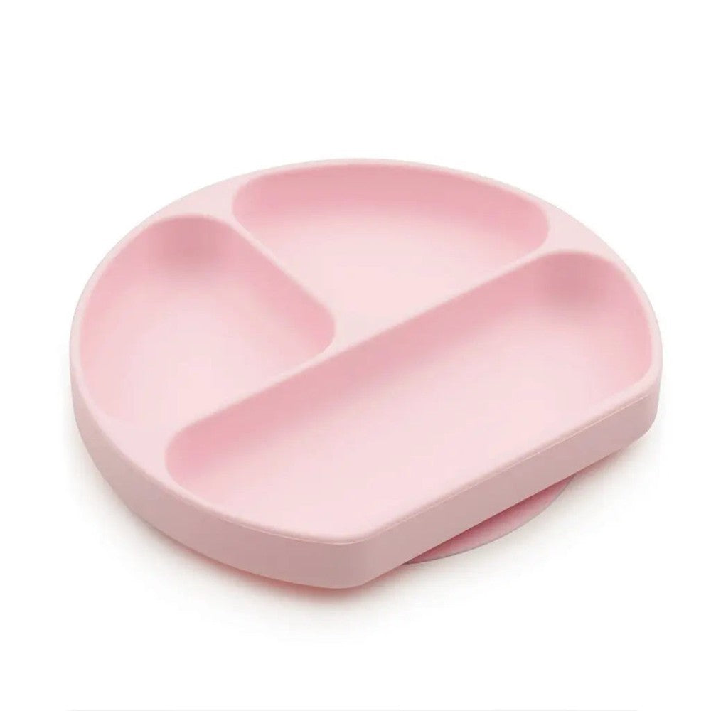 Bumkins Silicone Grip Dish pink with three divided sections shown in use during baby feeding