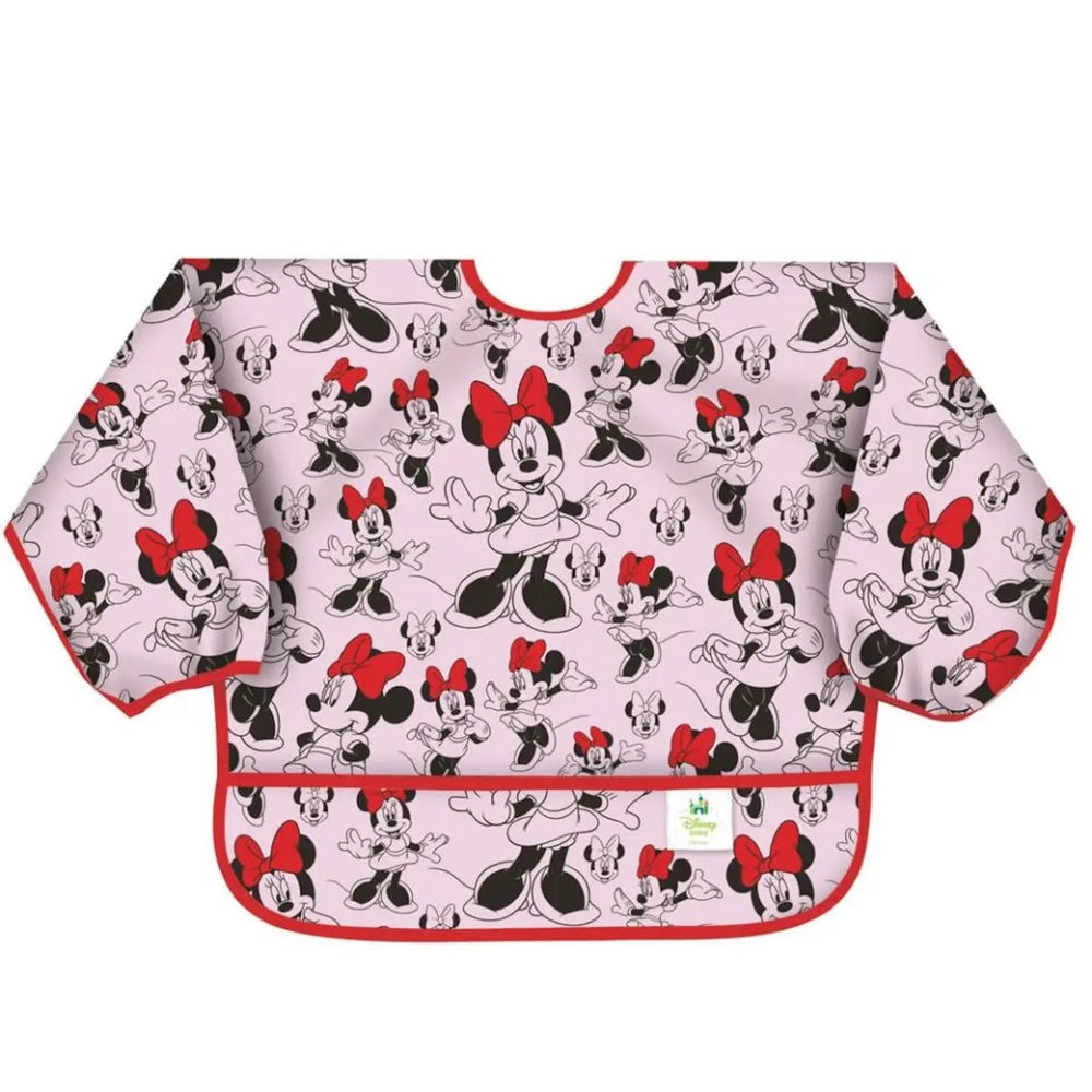 Bumkins Sleeved Bib in pink Minnie Mouse print with red trim, sleeves catching spills during mealtime.