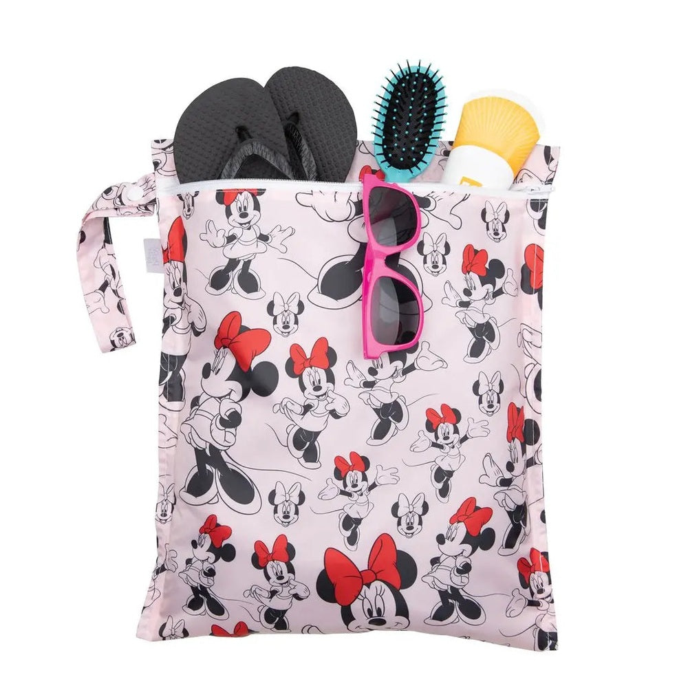 BUMKINS Wet Bag in pink Minnie Mouse print, open tote showing sunglasses, brush, flip-flops, and bath sponge inside.